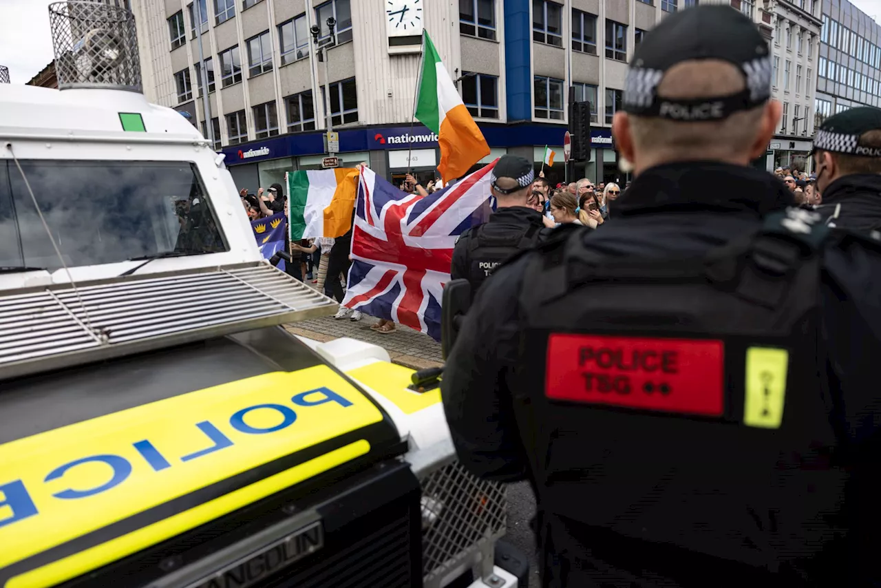 Irish anti-immigration activists 'disgraced the Irish flag' at Belfast protests