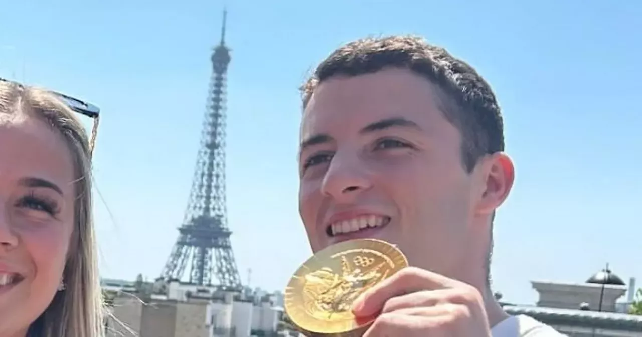 Olympic hero Rhys McClenaghan poses with girlfriend as he celebrates gold medal