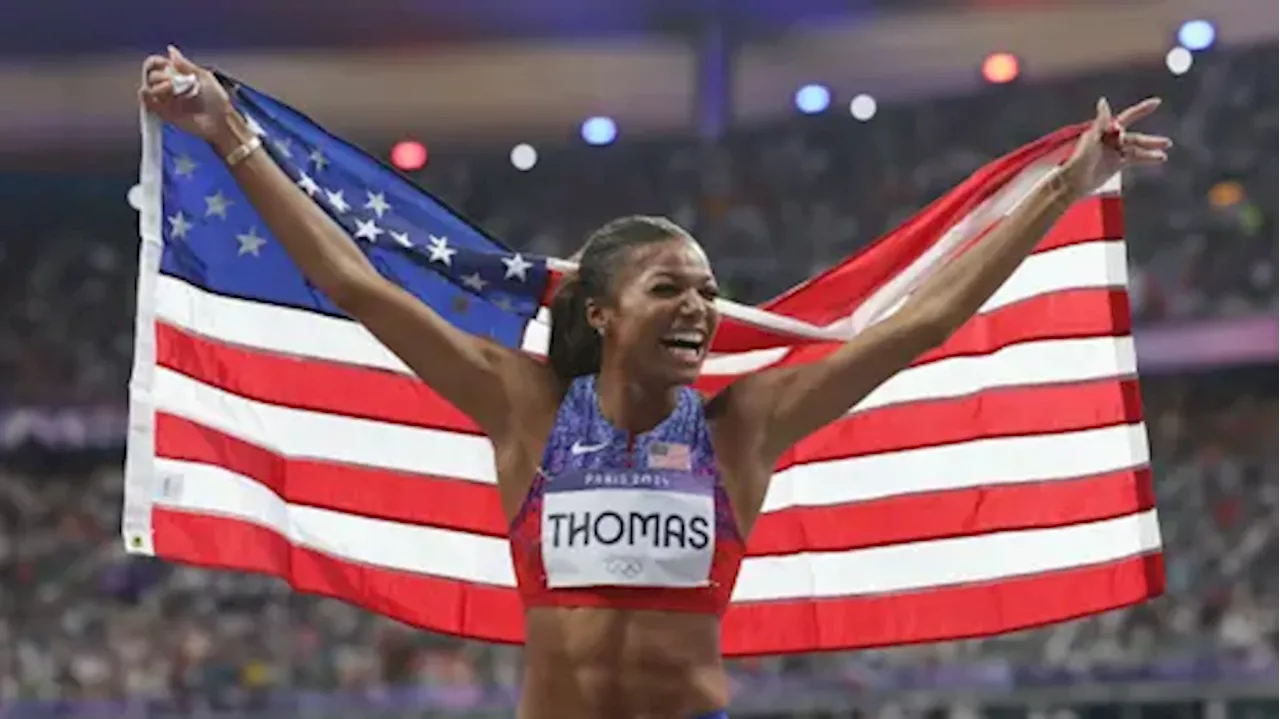 Thomas takes Olympic 200m, Hocker streaks to shock 1500m victory