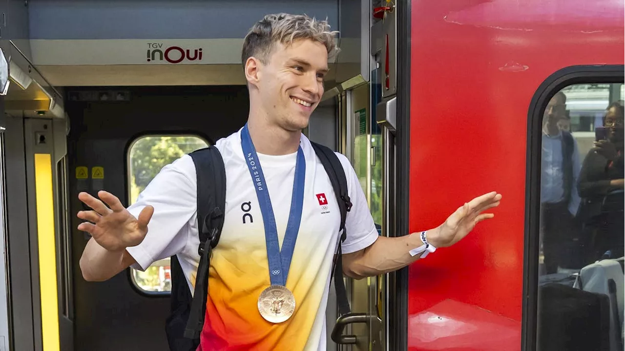 Roman Mityukov in Genf empfangen ++ Edelfan Nowitzki in Paris ++ Gold für Marks und Vaast im Surfen