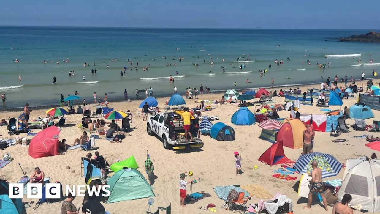 Lifeguards 'flat out' as people flock to Cornish beaches