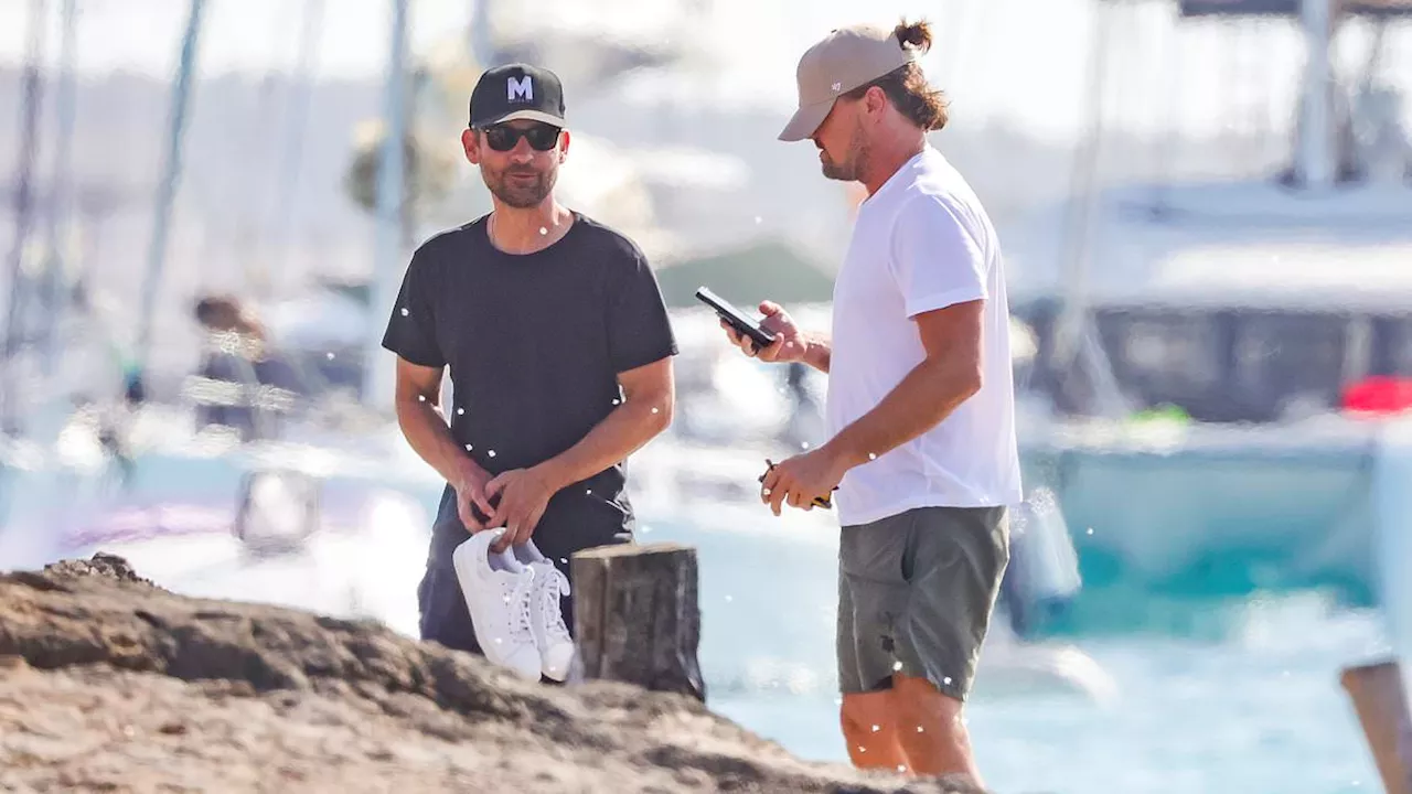 Leonardo DiCaprio and his girlfriend Vittoria Ceretti soak up the sun with his longtime pal Tobey...