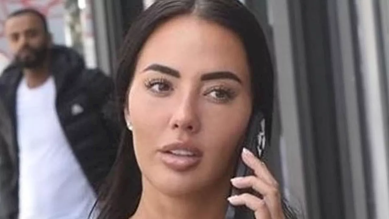 Yazmin Oukhellou displays her toned figure in a tiny crop top and flared leggings as she arrives at...