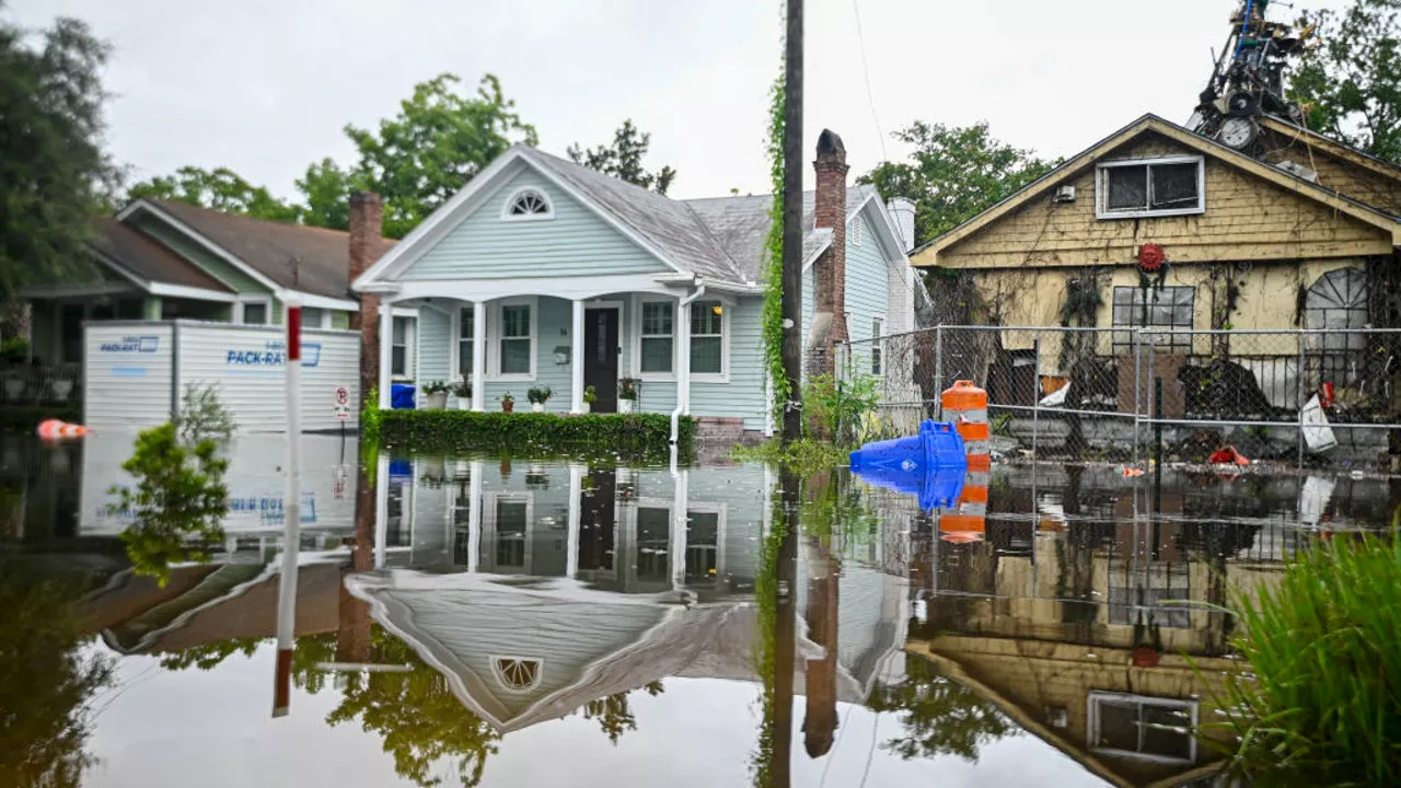 Tropical Storm Debby continues dumping rain over Carolinas before traveling north