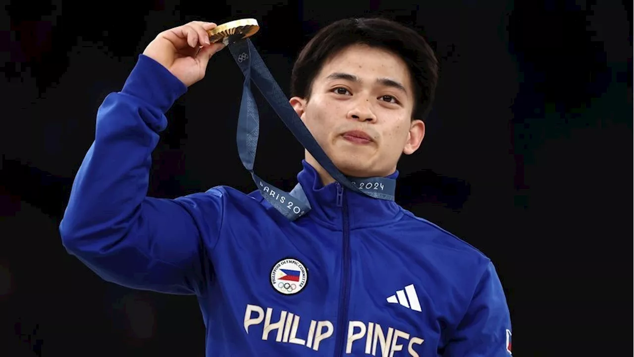 Gymnast wins condo and food for life after becoming his country's first male gold medalist