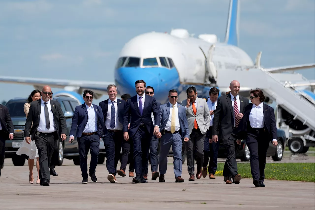 JD Vance tries to confront Kamala Harris on Wisconsin tarmac — inspects his 'future plane' instead