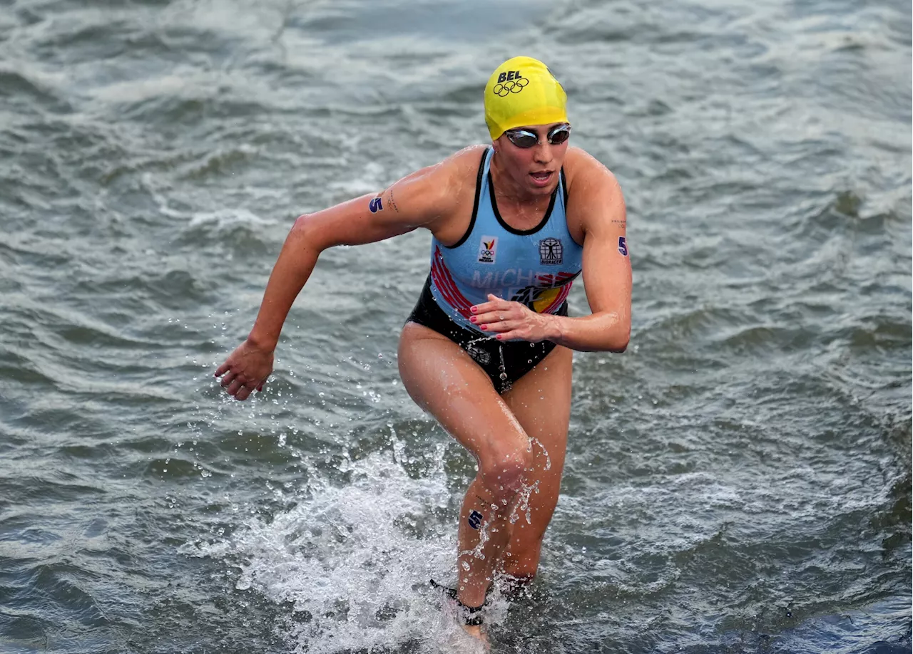 Belgian triathlete says E. coli not her cause of illness after swimming in polluted Seine