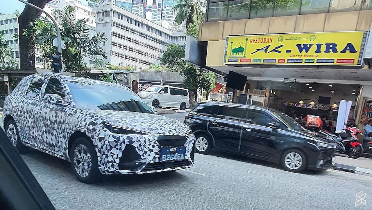 Heavily disguised Proton e.MAS EV goes through Bukit Bintang