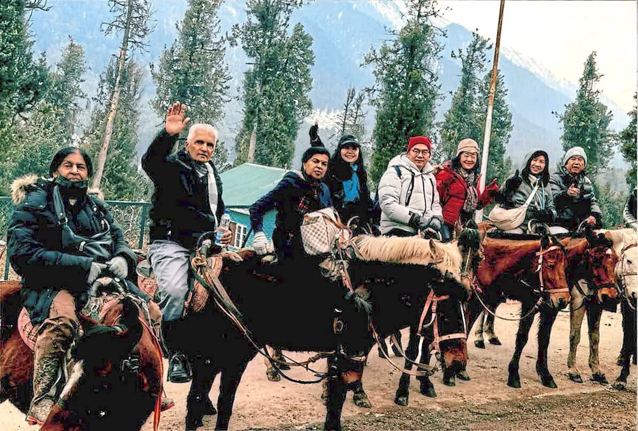 This couple in their 70s rode horses and went sledding in wintry Kashmir