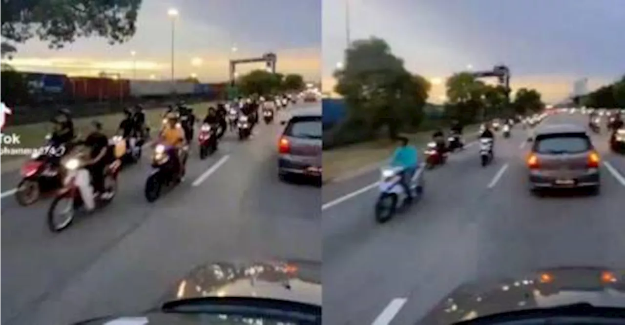 Hundreds mat rempit ride against traffic on Penang highway