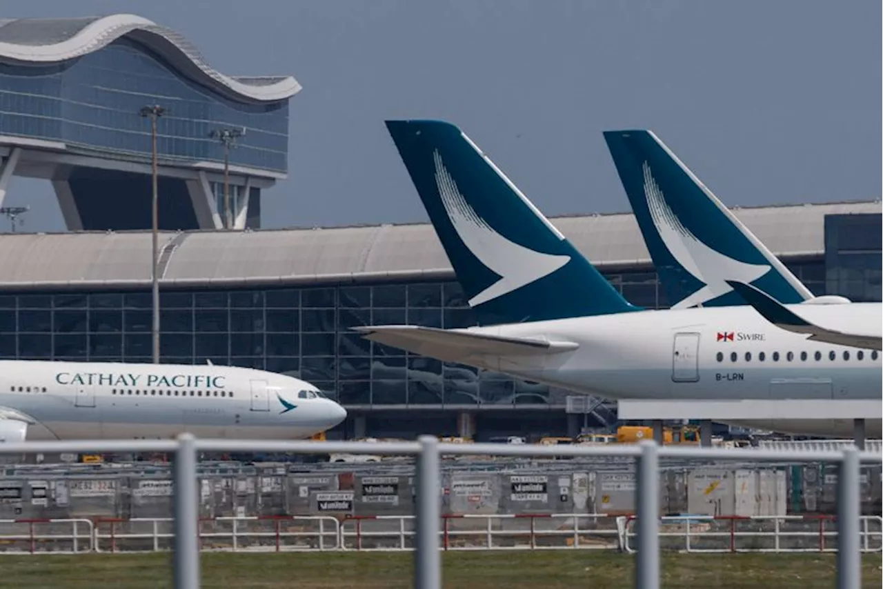 Hong Kong's Cathay Pacific announces interim dividend, profit drops 15%