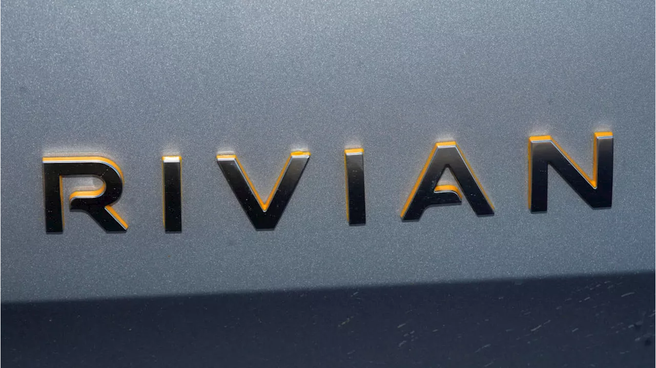 Rivian stock falls on $1.4B loss reported in mixed earnings