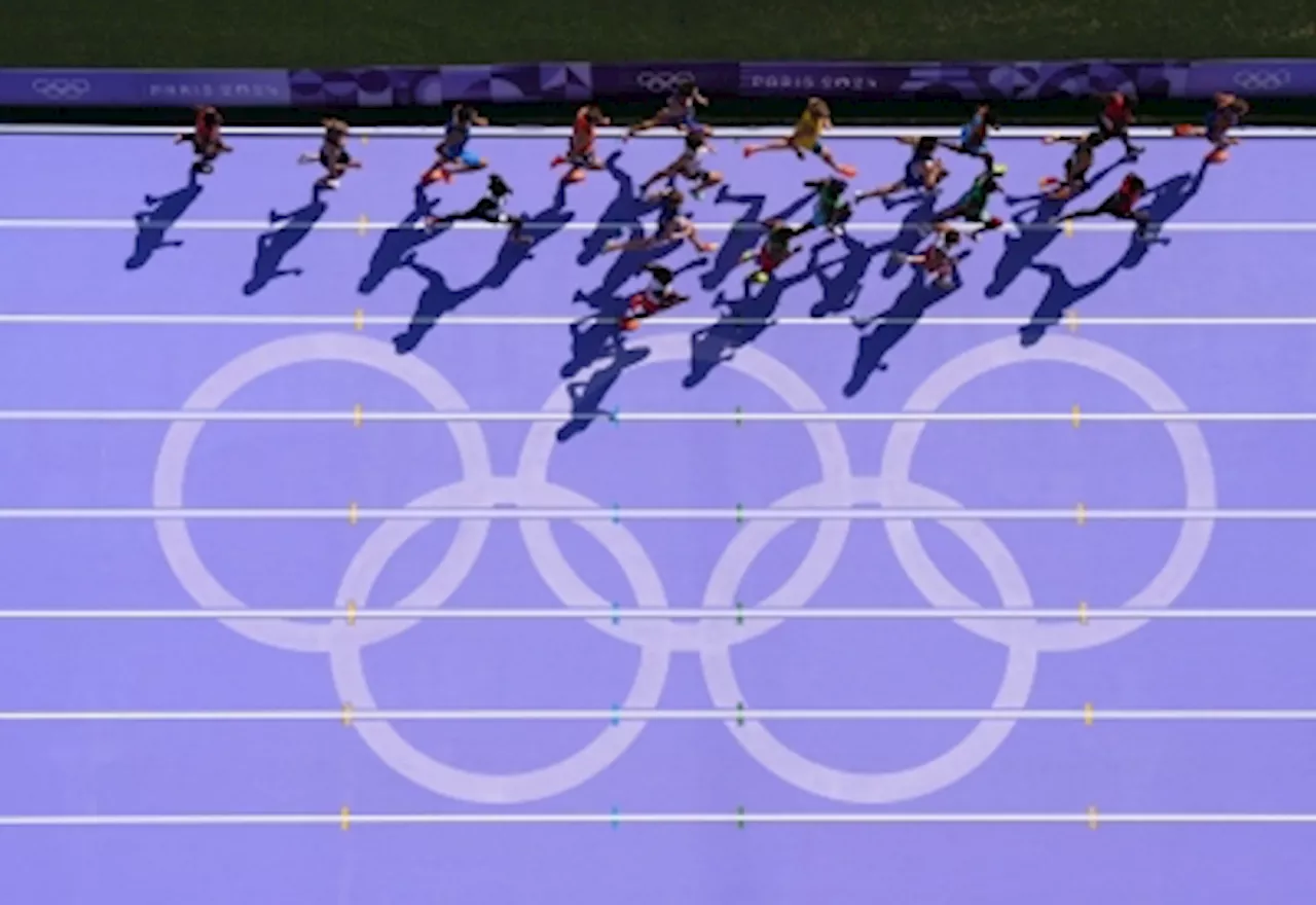 Olympic broadcaster says sorry after camera operator walked onto track during 5,000-m race