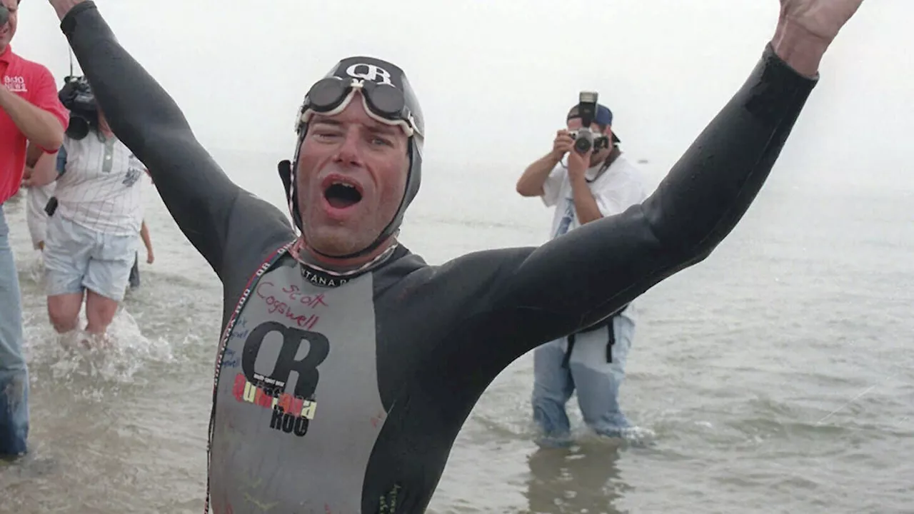 Marathon swimmer ends his quest to cross Lake Michigan after two days