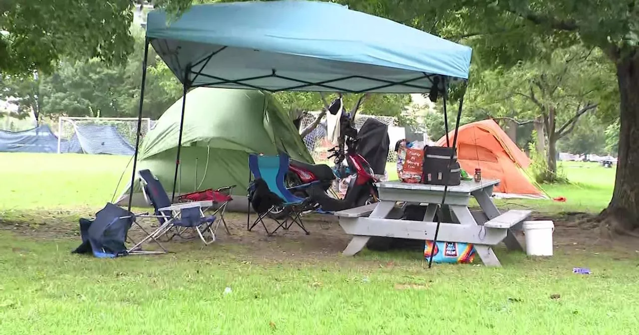 Migrants forced out of NYC shelter living in tents as Debby's remnants bring state of emergency