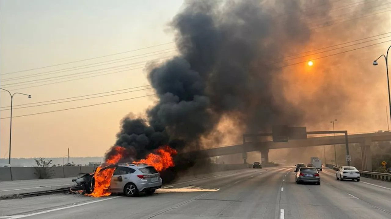 Car collides with barrier on I-5 near Tacoma Dome, fire erupts