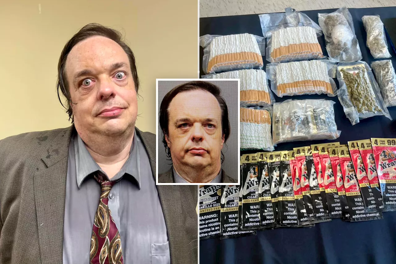 Bug-eyed Mississippi attorney looks soaking wet after he's arrested for smuggling phones, drugs into prison