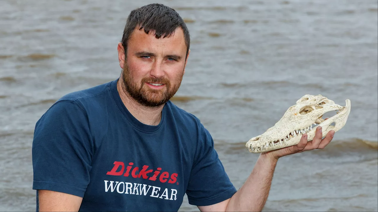 Fisherman stunned after hooking CROCODILE head out of Scots river...