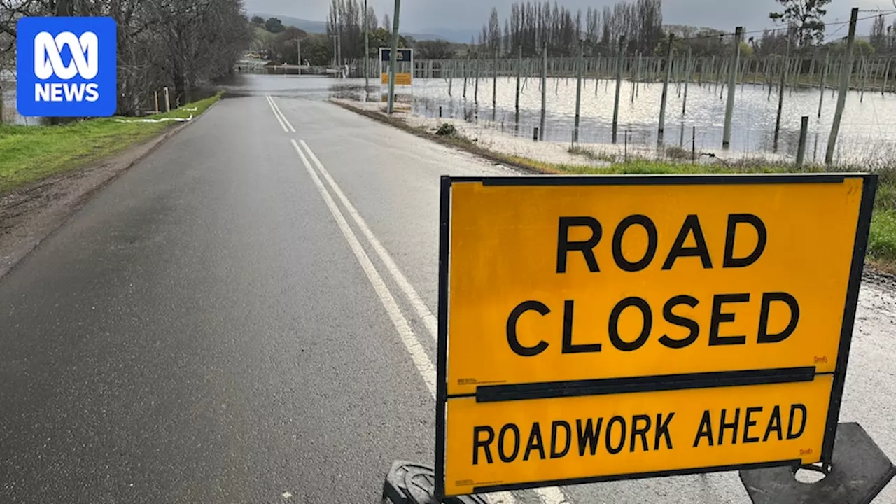 Live: BOM warns of Tasmanian flooding risk as power still out to thousands of people