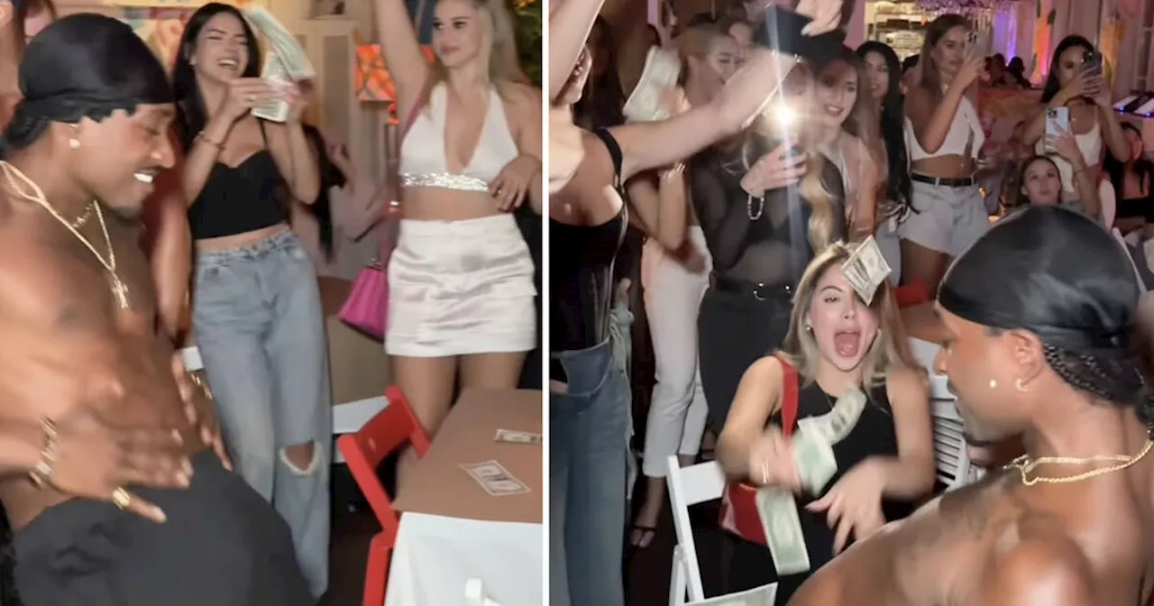 New Toronto pop-up has women throwing money at shirtless male dancers