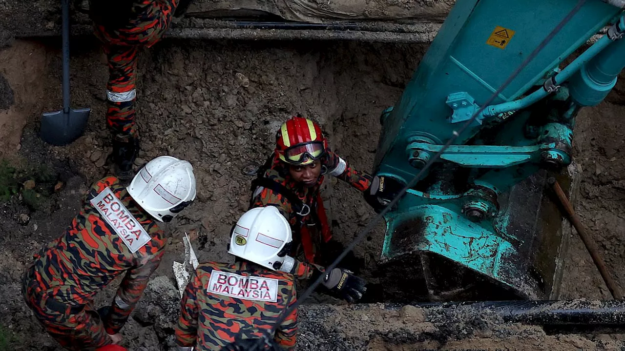 Divers stop 'too risky' search for woman who disappeared down sinkhole