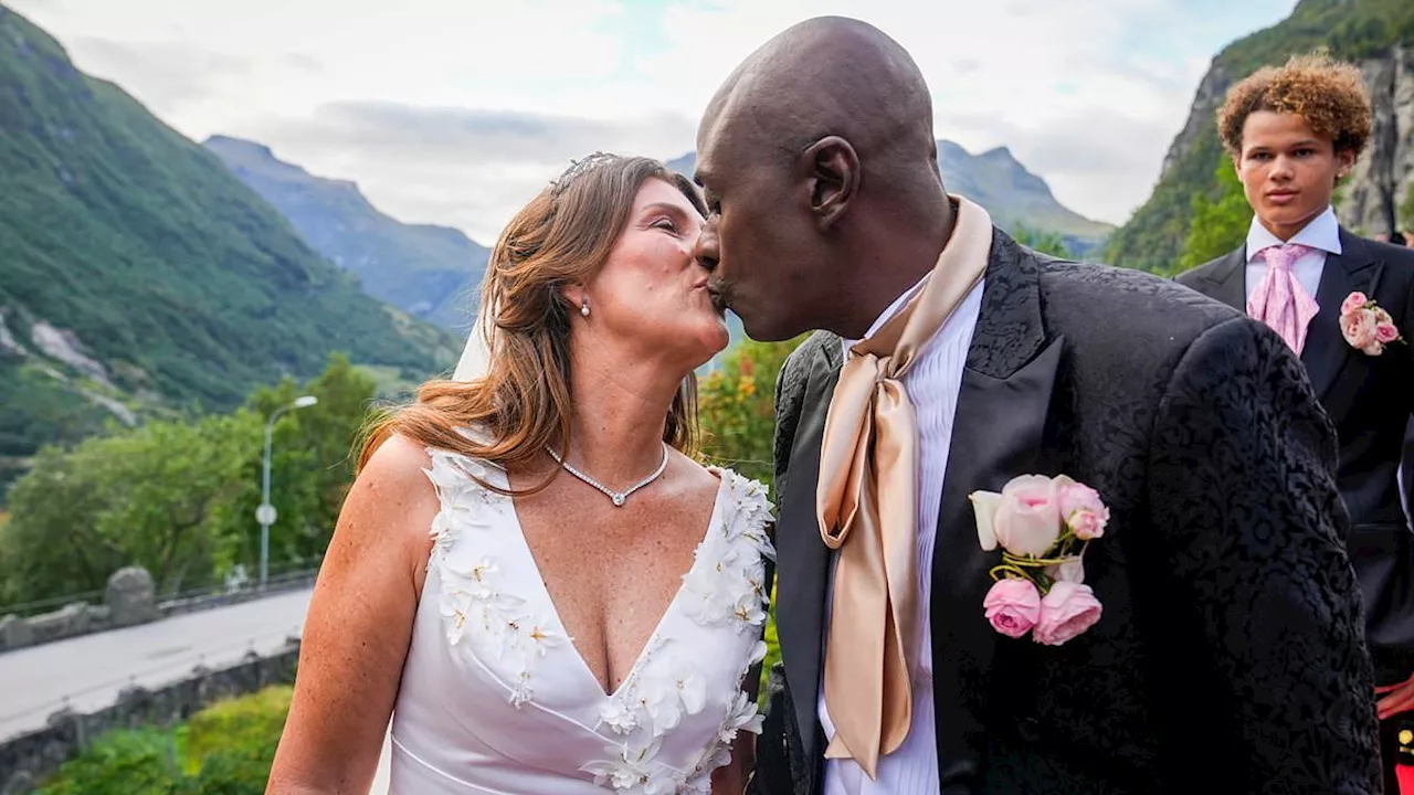 Princess Martha Louise and Shaman Durek share a kiss as they wed