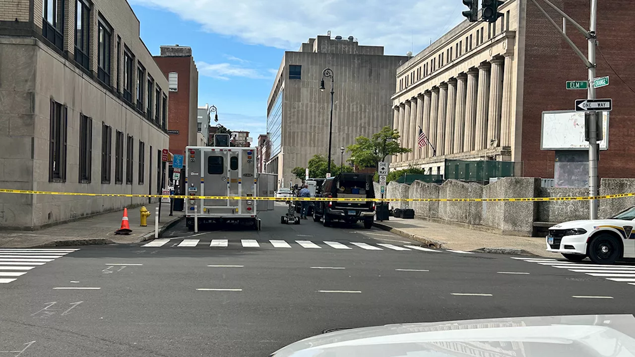 Streets closed after suspicious devices were found near city hall in New Haven, Conn.