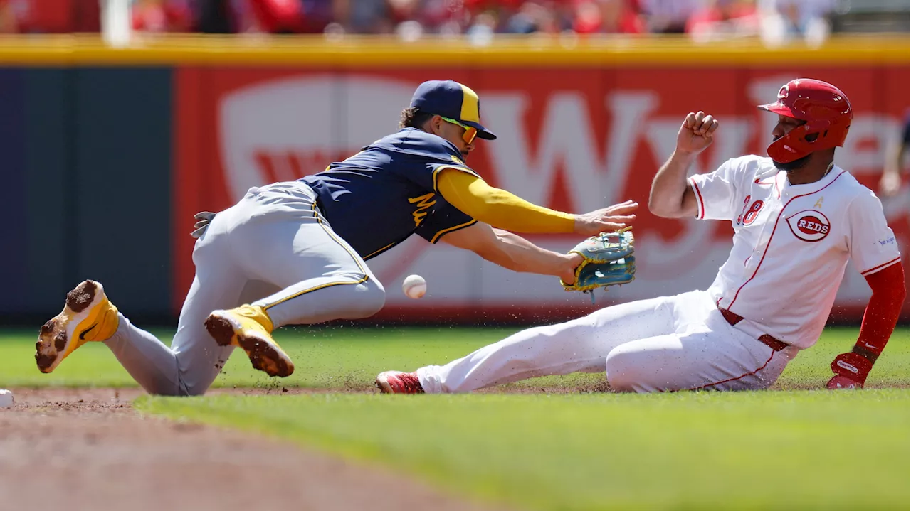 Espinal gets game-ending hit as Reds beat Brewers in 11 innings