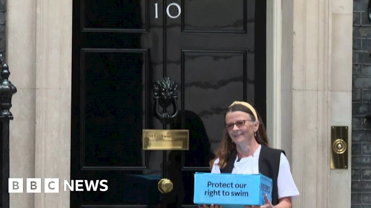 Exmouth campaigner hands sewage petition to Downing Street