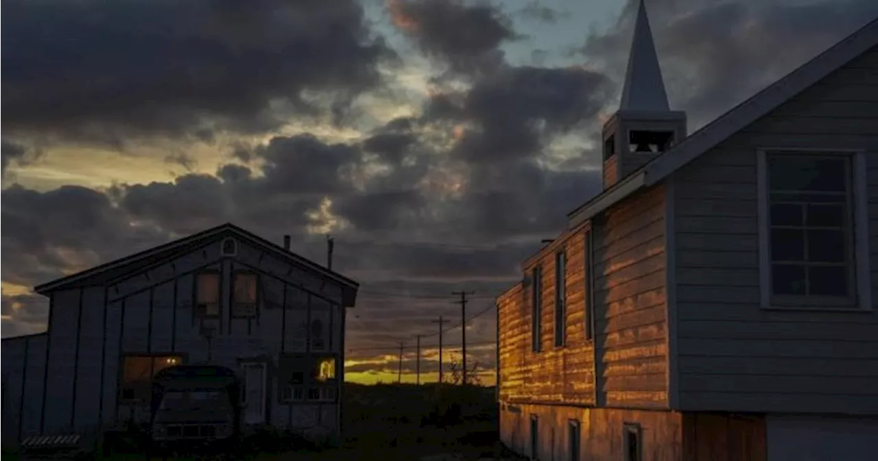 As warming threatens polar bear tourism and the ground below, a Manitoba town adapts and thrives