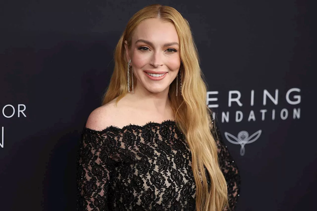 Lindsay Lohan Dons Sheer Lace Bodysuit at Kering Foundation Caring for Women Event