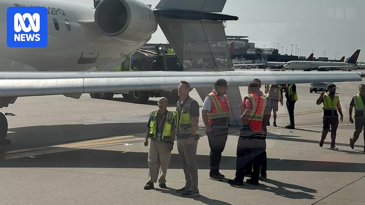 Tail section knocked off Delta plane during collision at Atlanta airport