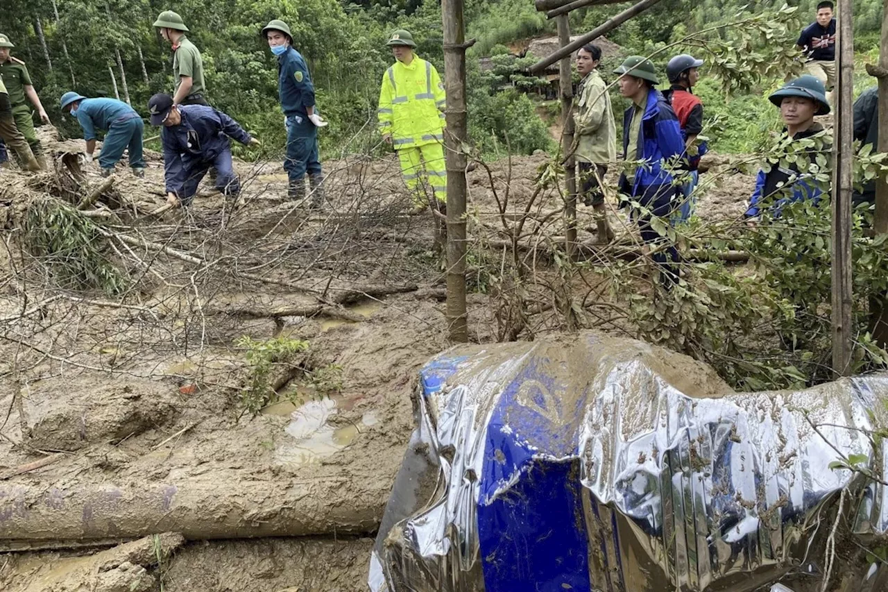 Flash flood sweeps away hamlet as Vietnam's storm toll rises to 141 dead