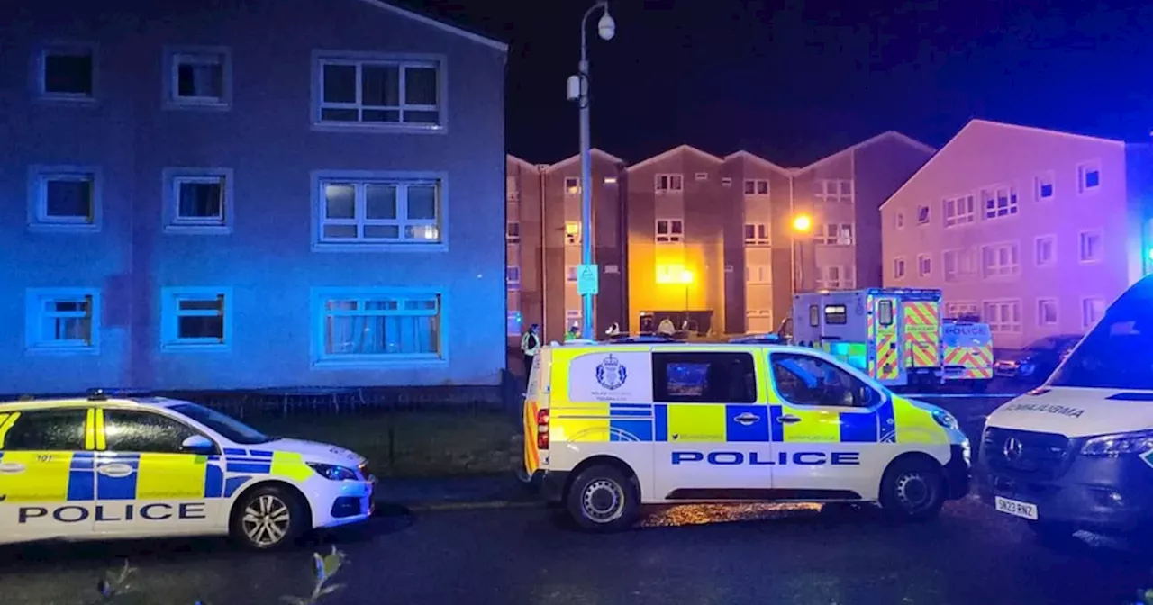 Man found dead in block of Scots flats and woman in hospital after 'disturbance'