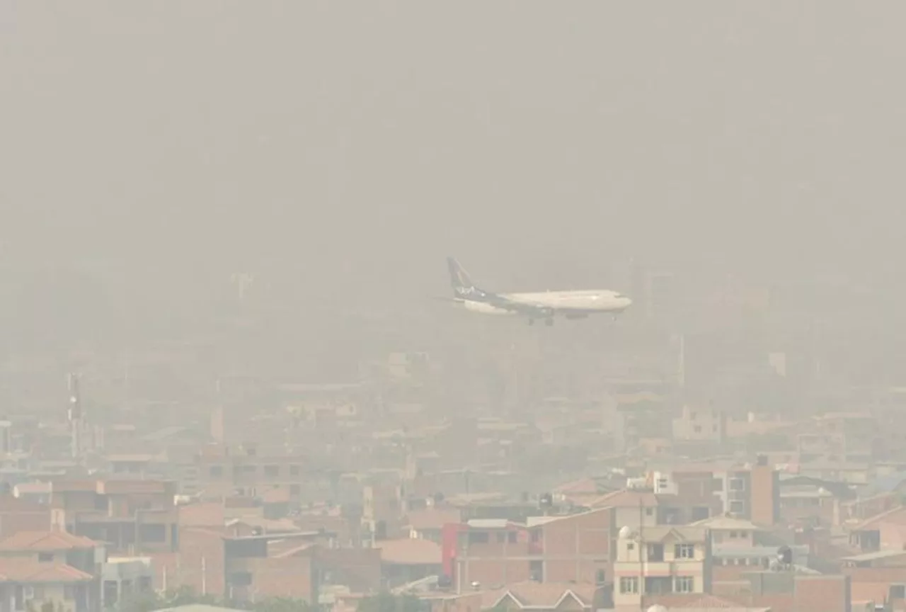 As Bolivia wildfires rage, smoke turns day into night