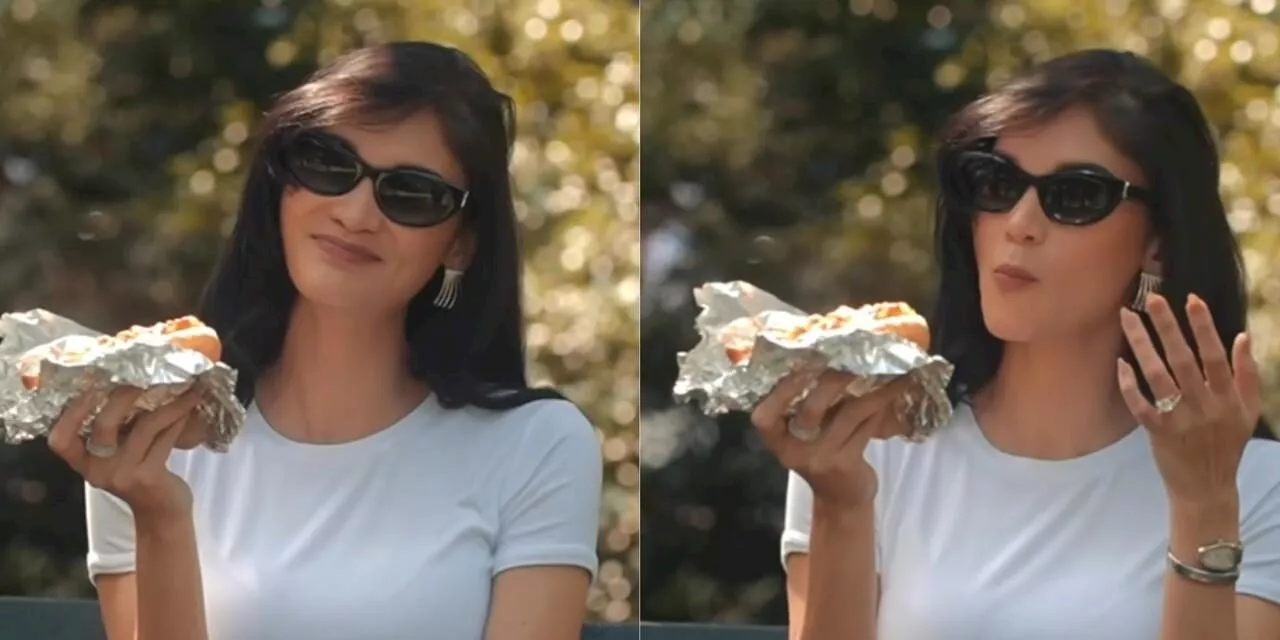 Pia Wurtzbach enjoys New York’s famous hotdog sandwich in Central Park