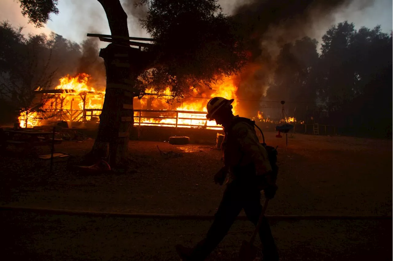 Homes destroyed near Lake Elsinore as massive Airport fire continues to burn