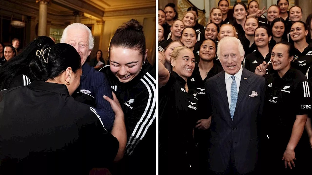 King Charles affectionately mobbed in 'scrum' with New Zealand women's rugby team