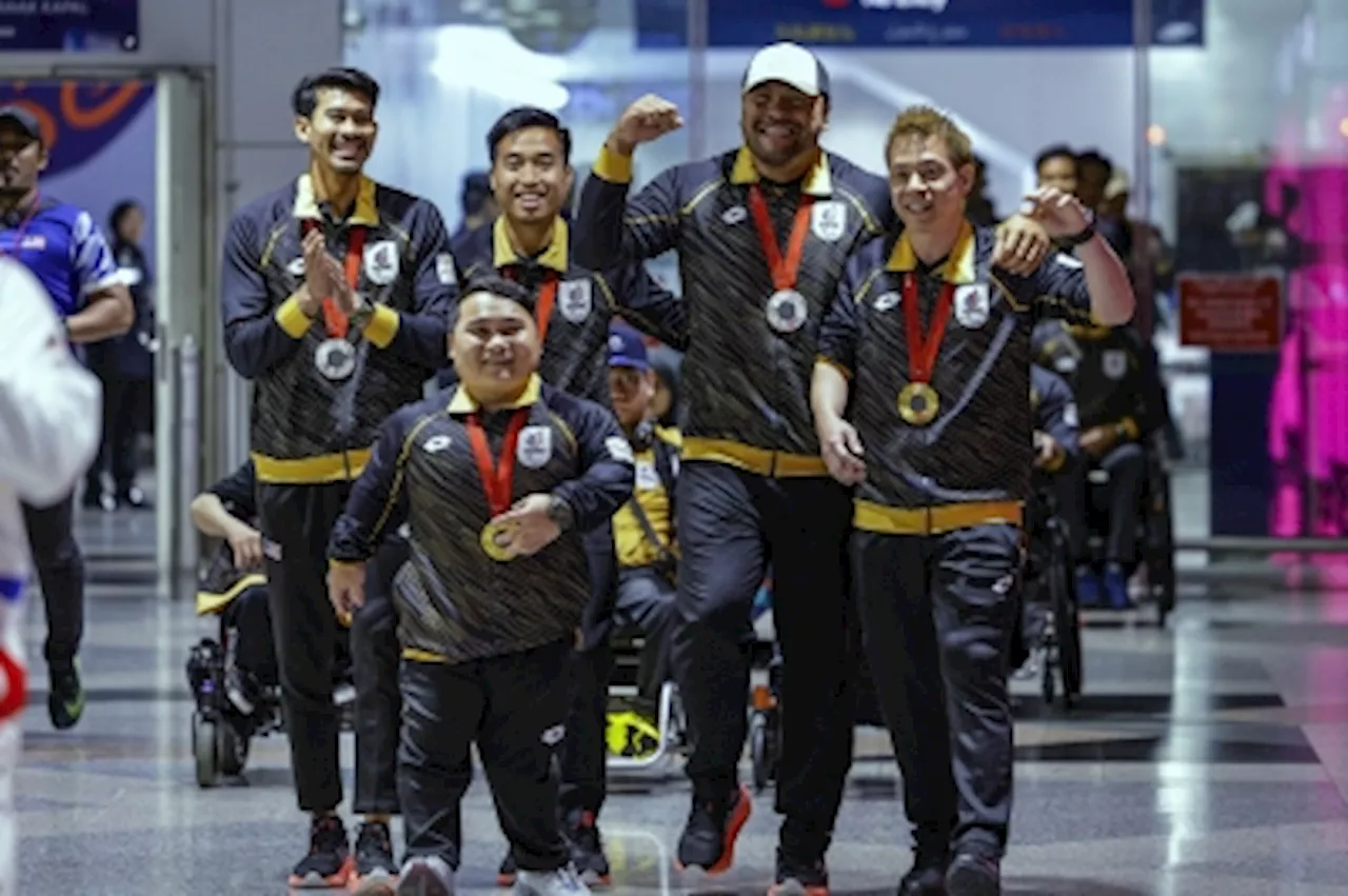 Bringing home two gold medals, Malaysia’s Paralympic heroes return to thunderous applause