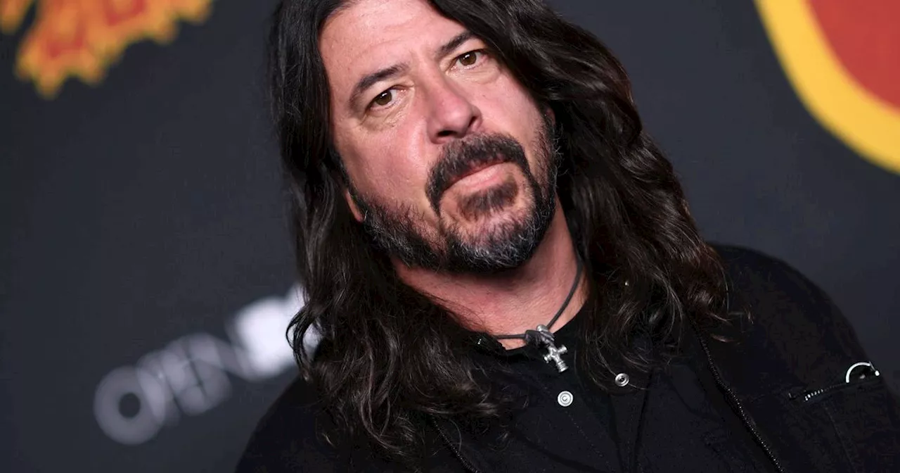 Dave Grohl admits cheating on wife and says he has fathered a child with lover