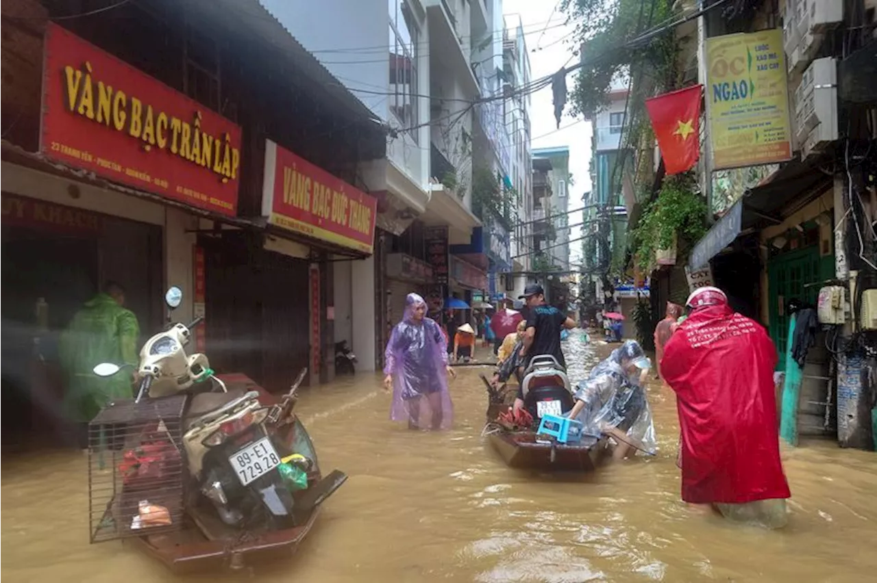 Red River floods Hanoi streets as Vietnam reels from impact of Typhoon Yagi