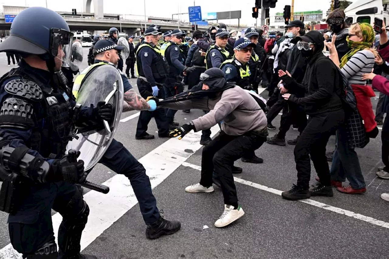 Police, anti-war protesters clash outside arms expo