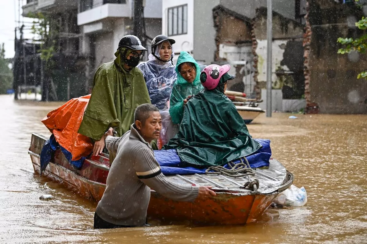 Vietnam evacuates 59,000 as typhoon floods toll climbs to 143