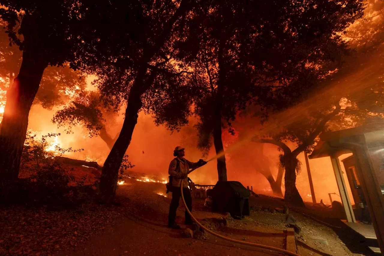 Wildfires burn out of control in Southern California and more evacuations ordered