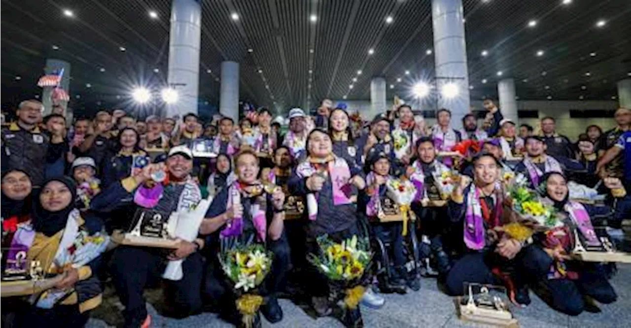 2024 Paris Paralympic athletes return to thunderous applause at KLIA