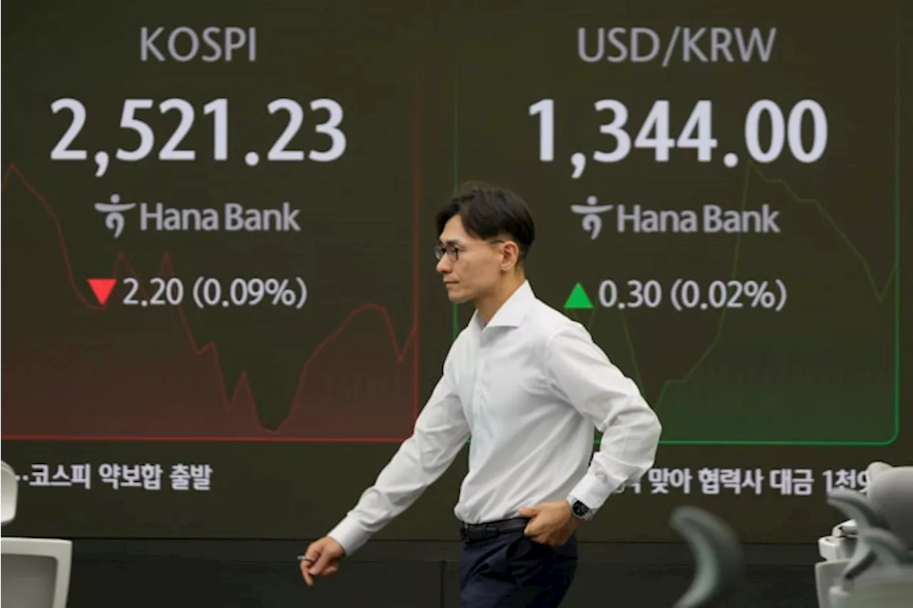 Stock market today: Asian benchmarks dip after Wall Street's mixed finish