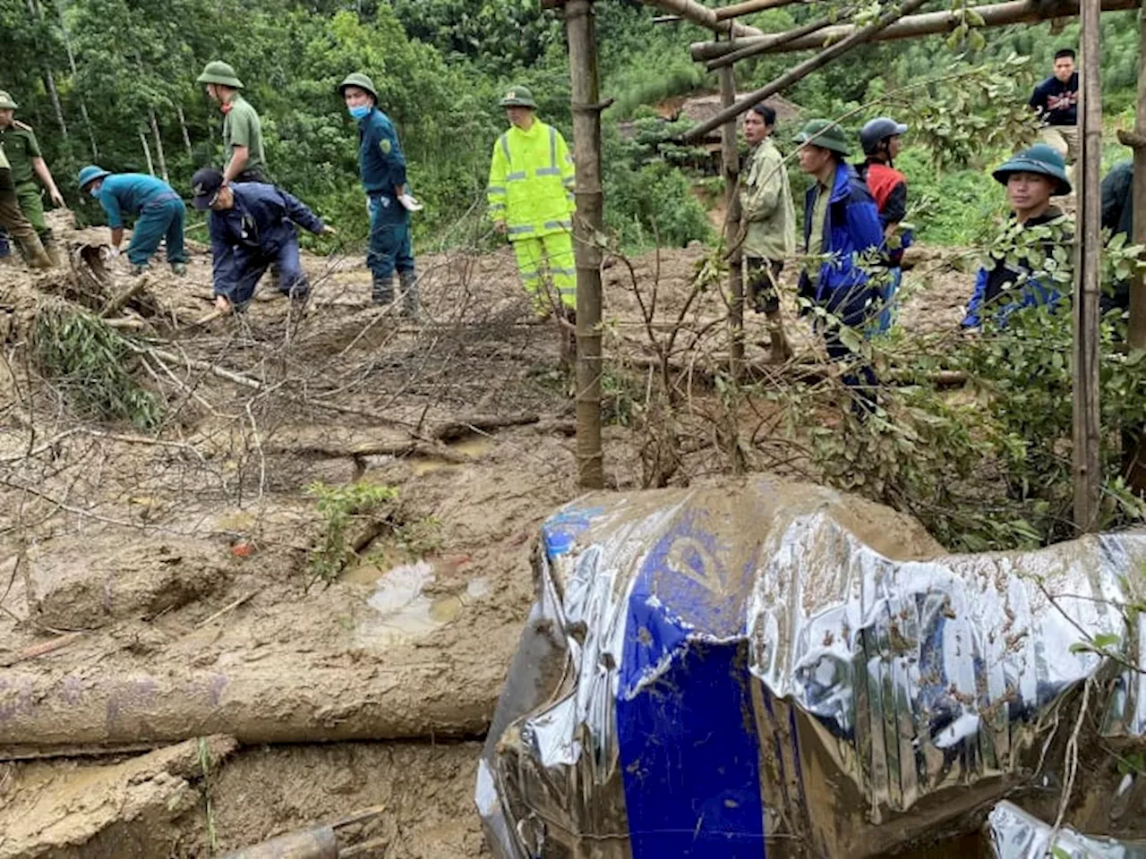 Vietnam death toll climbs to 197 as typhoon's aftermath brings flash floods and landslides