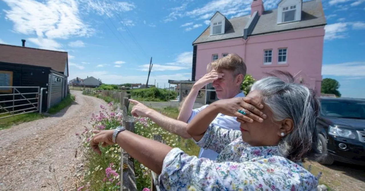 Couple banned from looking at neighbours house have charges dropped