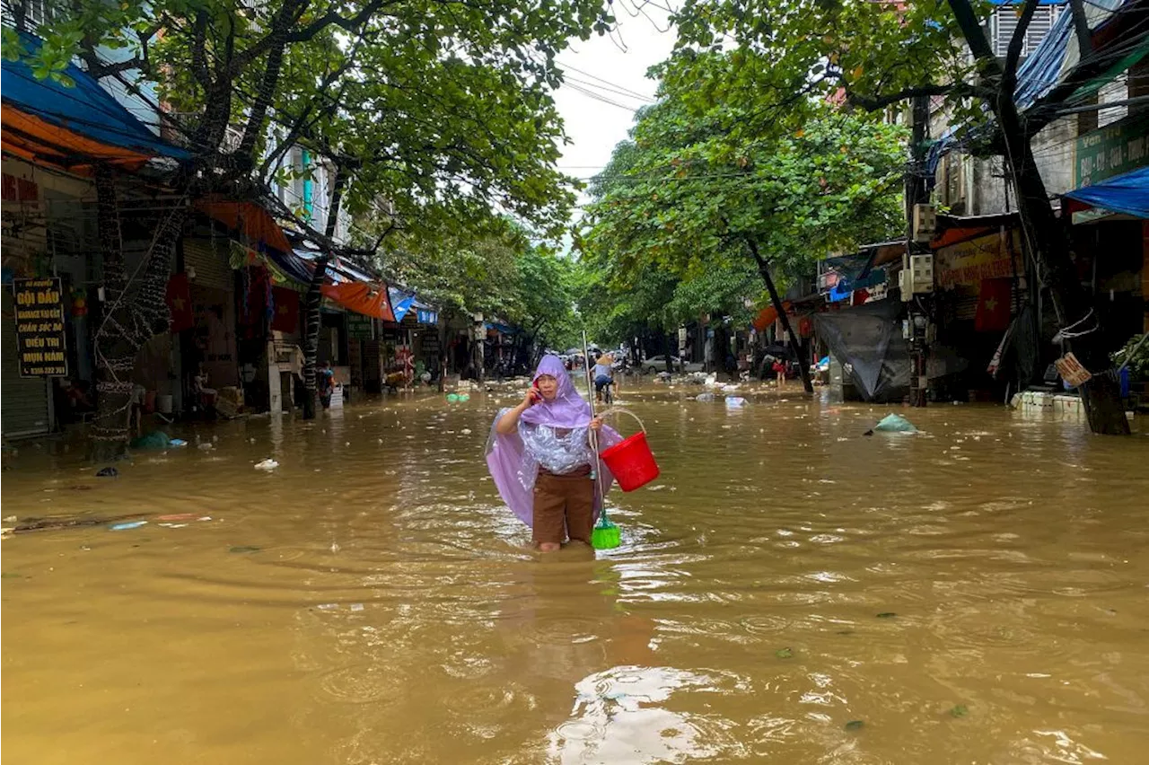 Parts of Hanoi remain flooded as landslides hit northern Vietnam