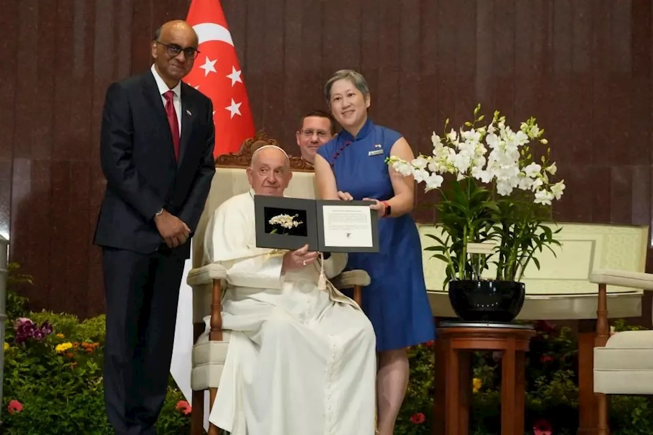 Pope marvels at Singapore's skyscrapers and asks that the lowest migrant workers not be forgotten